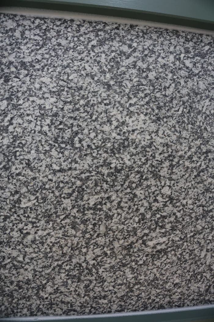 De Lank Cornish granite honed finish — A smooth, matte surface achieved by grinding progressively finer abrasives. The