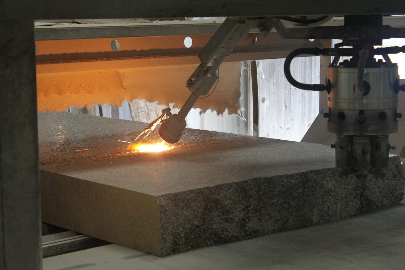 De Lank granite in six finishes — flamed, honed, polished, sawn, hand punched, dolly pointed