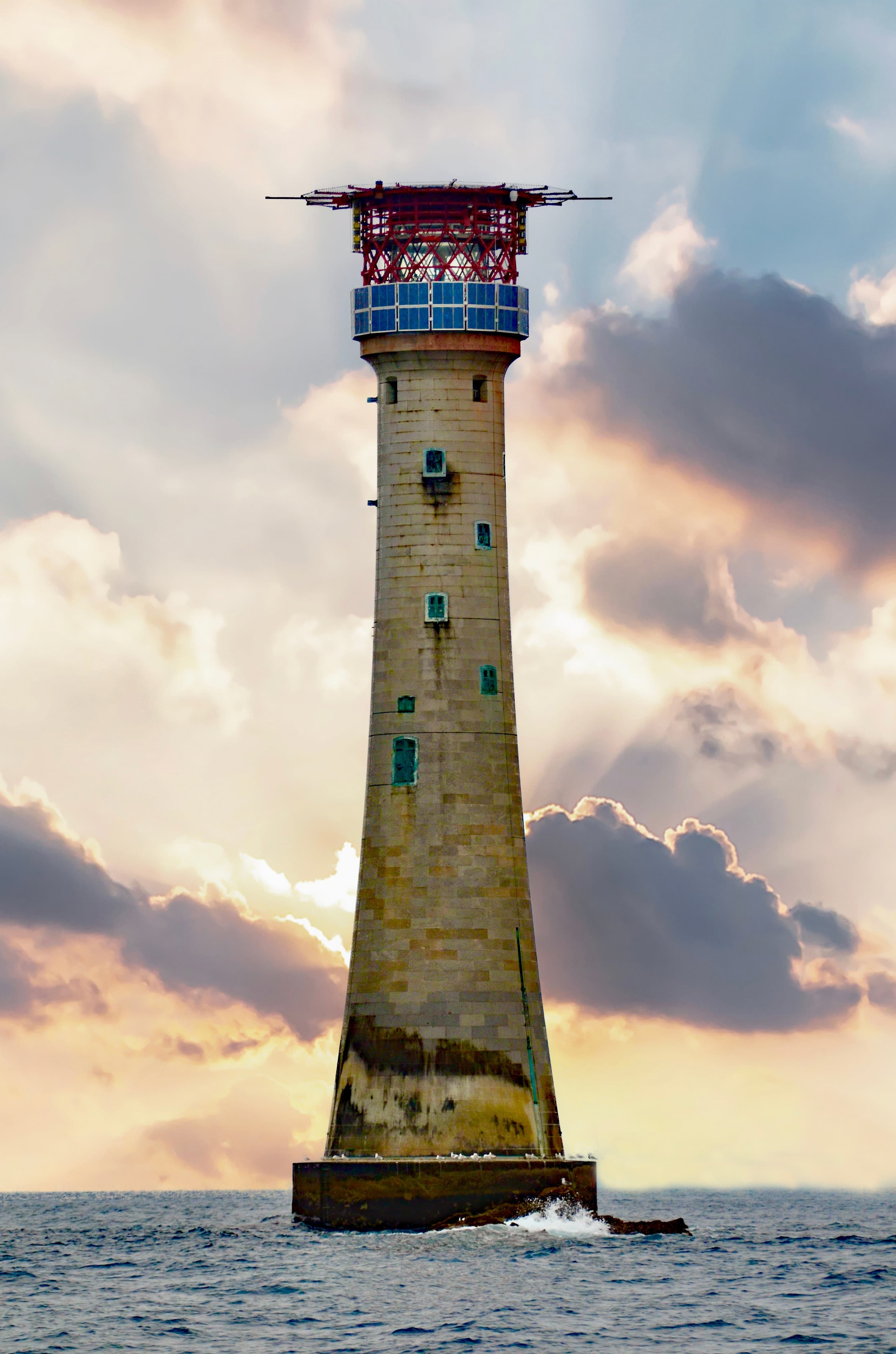 The fourth Eddystone Lighthouse, built from De Lank granite and completed in 1882, standing on its reef fourteen kilometres off Plymouth